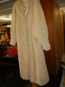A white fur coat.