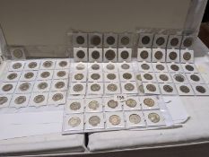 A collection of 77 £2 coins including rare examples.