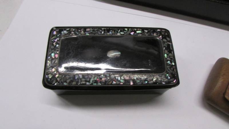 A Japanese lacquered brush box, a lacquer and mother of pearl pill box and three other boxes. - Image 4 of 6