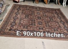 A brown patterned carpet - 90 inches x 106 inches (COLLECT ONLY)