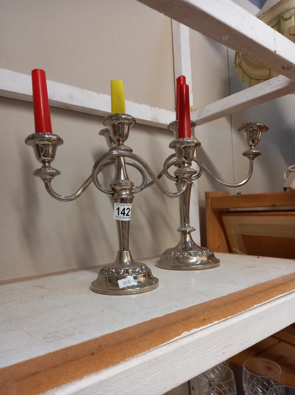 A pair of silver plated candelabra - Image 2 of 2