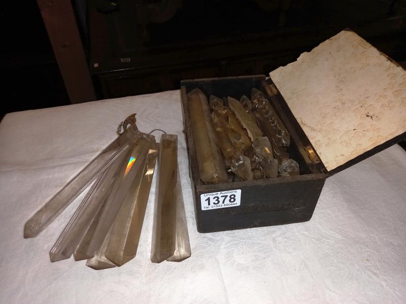 A box of chandelier droppers