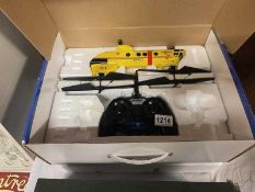 A boxed Blade Max Tandem rescue RC helicopter (untested)