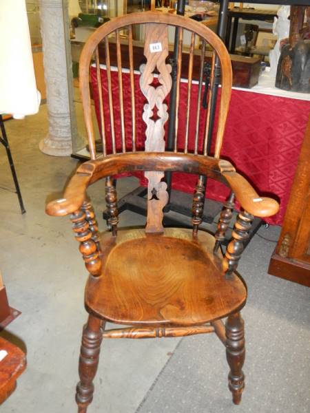 A Victorian Windsor chair. (back slat a/f).