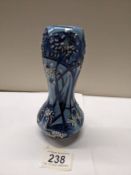 A 2002 Moorcroft florian style vase by Emma Bossuns.