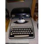 A vintage Remington Envoy typewriter (COLLECT ONLY)