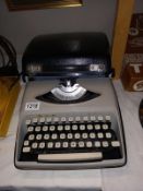 A vintage Remington Envoy typewriter (COLLECT ONLY)