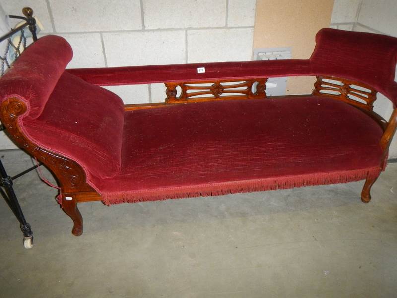 An Edwardian chaise longue.