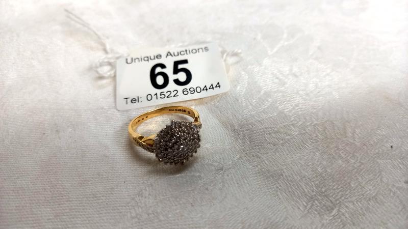 A diamond cluster ring set in 18ct gold, hall marked London 1993, approximately half carat, - Image 3 of 3