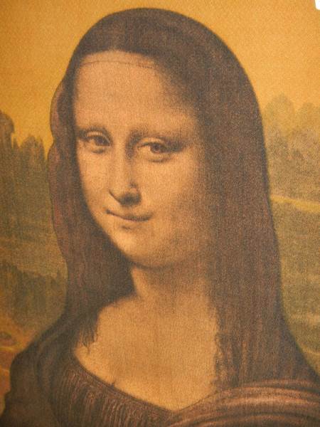 A framed print on silk of the Mona Lisa. 74 x 49 cm. - Image 3 of 3