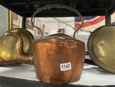 A large victorian copper kettle