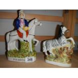 Two 19th century Staffordshire figures being Prince and a Zebra.