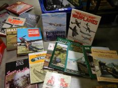 A box of railway and aircraft related books.