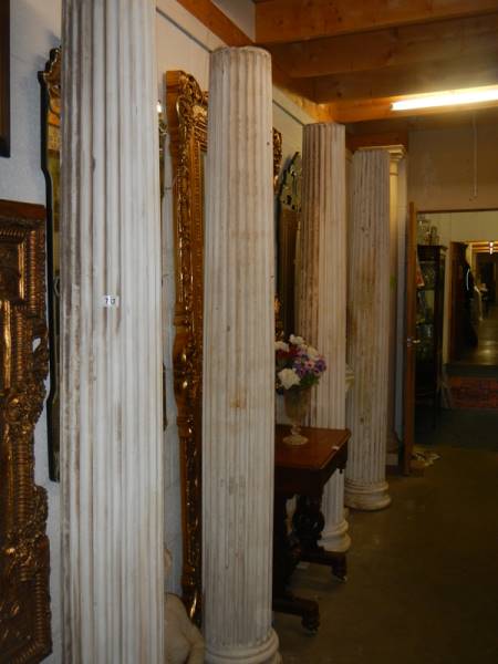 A set of four tall columns. COLLECT ONLY.