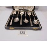 A cased set of six hall marked silver tea spoons, 105 grams.