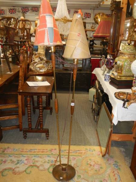 A retro twin light standard lamp with original shades.