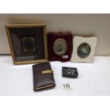 Two miniature portraits, a framed photograph, snuff box and prayer book.