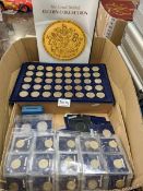 A large collection of UK collectable coins including uncirculated, 50p, £1, £2, folders etc.,