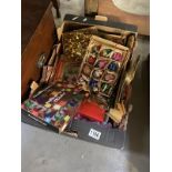 A large box of vintage Christmas decorations including fairy lights