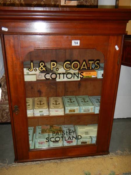 A J & P Coates Cottons sign writtend cabinet with vintage cotton box contents.