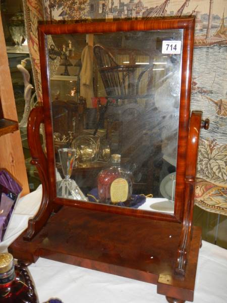 A Victorian mahogany toilet mirror.