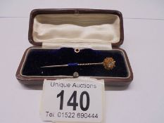 A 19th century 15ct gold and diamond stick pin with converter to collar stud.