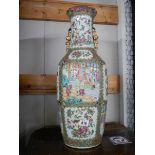 A tall Chinese vase (badly cracked).