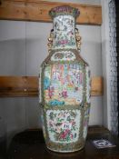 A tall Chinese vase (badly cracked).