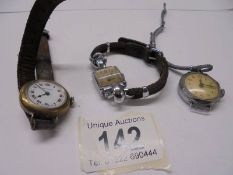 Three vintage ladies wrist watches.