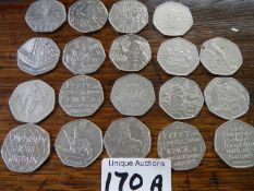 Nineteen collectable fifty pence pieces.