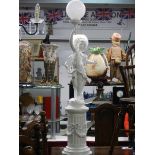 A floor standing lamp in the form of a cherub on a pedestal. COLLECT ONLY.