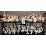 A good collection of crested china including Carlton ware, Arcadian & Goss (2 shelves)