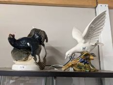 A good pottery model of a Capercaillie and a Davica pottery model of a dove. COLLECT ONLY.