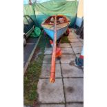 A wooden hulled dingy/boat with mast & Keel etc. (needs attention) complete with trailer &