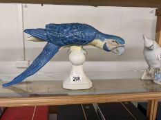 A Royal Dux blue macaw.