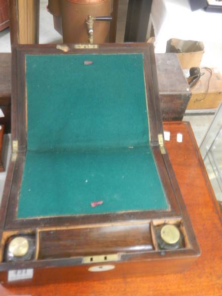 A Victorian mahogany writing box.