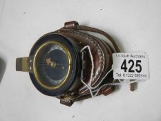 WW2 British Army prismatic compass in fitted leather pouch.