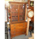 An astragal glazed bookcase on drawer base. COLLECT ONLY.