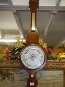 A Victorian mahogany barometer.