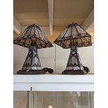 A pair of Tiffany style table lamps.