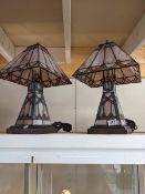 A pair of Tiffany style table lamps.