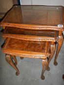 A good nest of walnut tables.