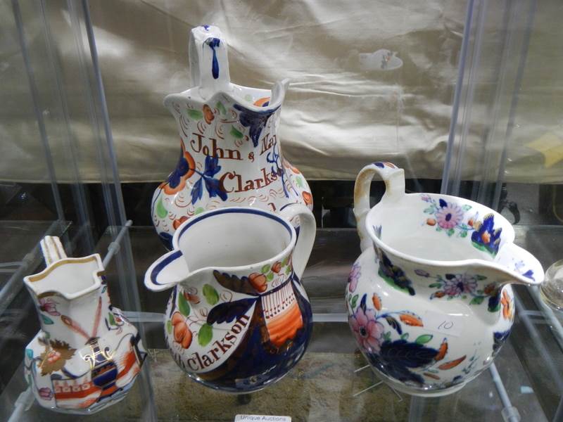 Two Victorian jugs inscribed John & Nan Clarkson and two others.