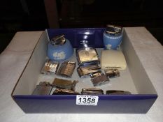 A tray of vintage lighters including Wedgwood