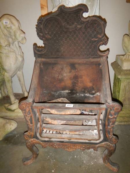 An early Victorian cast iron fire grate. COLLECT ONLY.