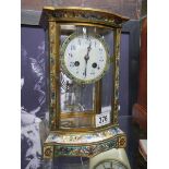 A brass and cloissonne' eight day mantel clock.