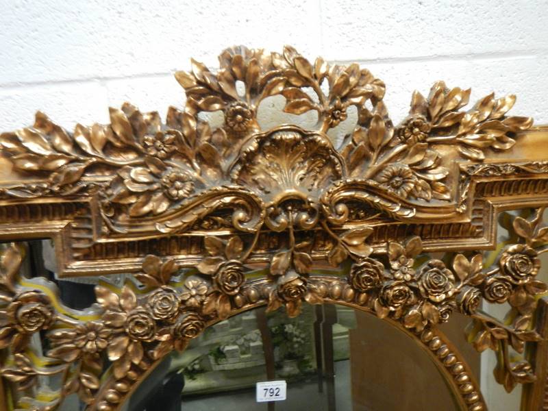 An oval mirror in an ornate gilt frame. COLLECT ONLY. - Image 4 of 5