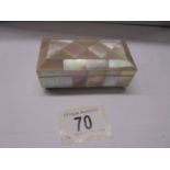 A three section mother of pearl stamp box.