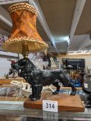 A 1930's spelter standing cocker spaniel table lamp, height to top of shade 28cm, base 15.5 x 19.5