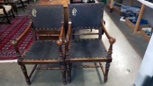 A pair of Georgian mahogany monogrammed carver chairs with large buttoned leather panels COLLECT
